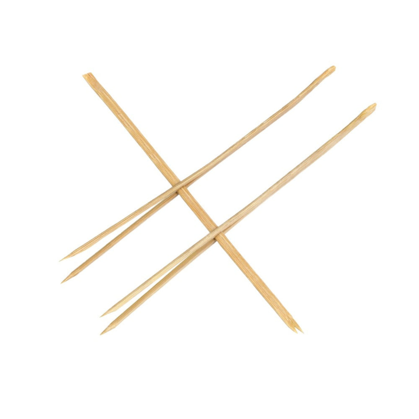 A crosswise arrangement of light brown bamboo cocktail picks against a white background.